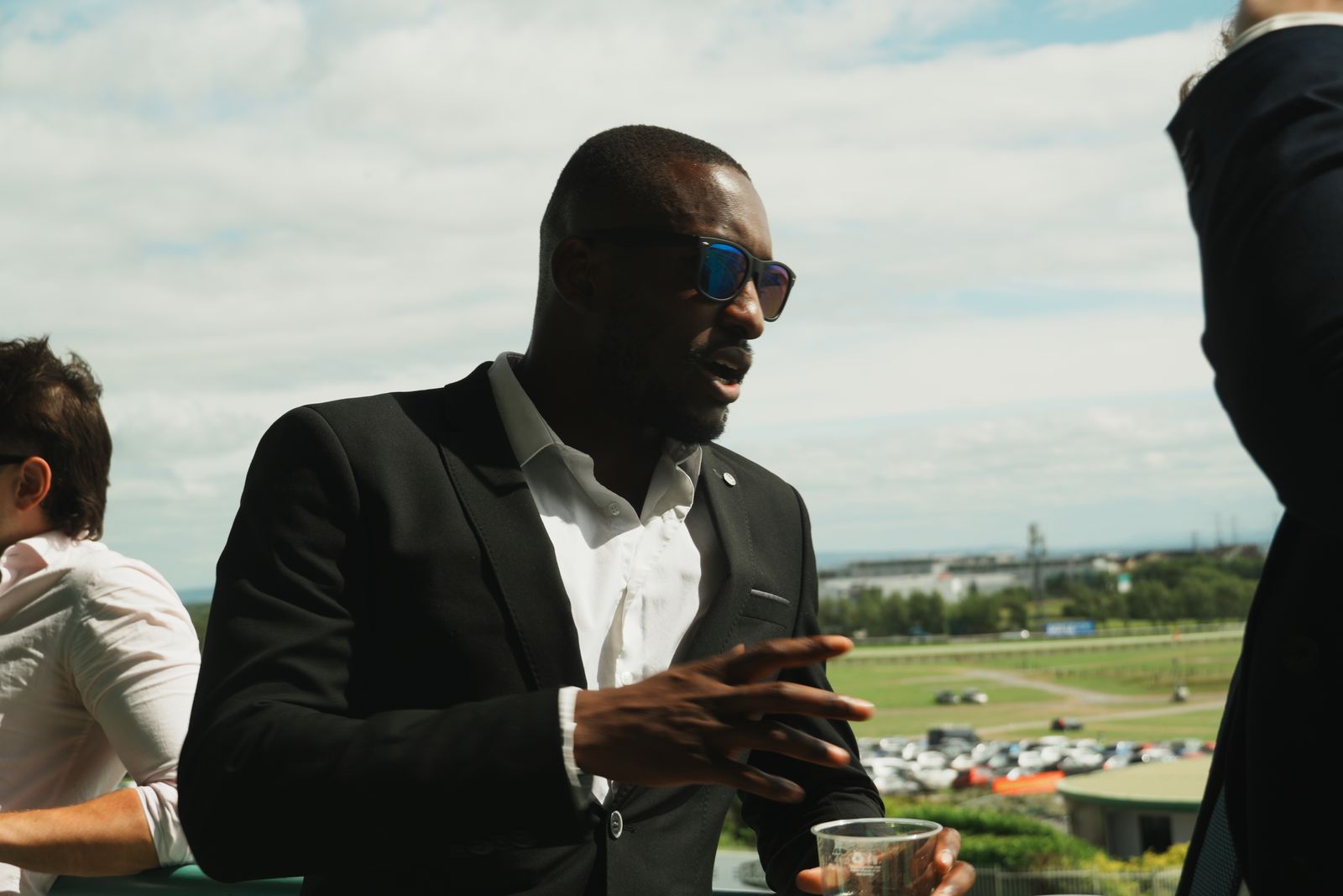 Client in a dark suit, shot on location